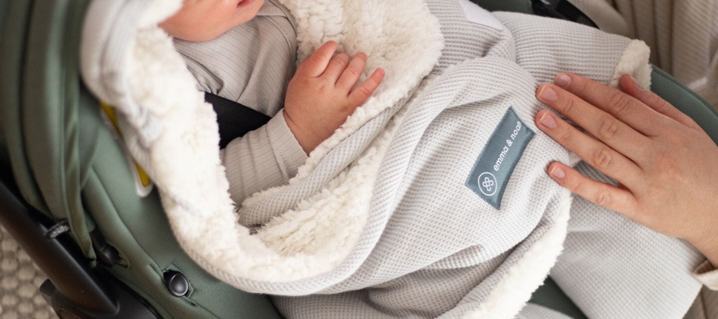 Wat trek je baby's aan in de autostoel of Maxi-Cosi?